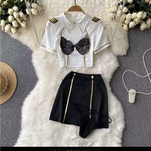 White and Black Pilot Costume with Gold Accents